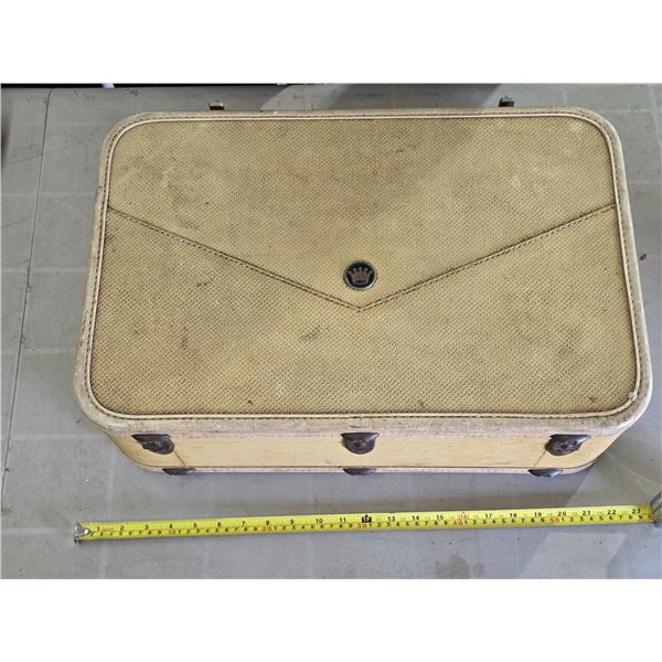 Vintage suitcase with purple interior