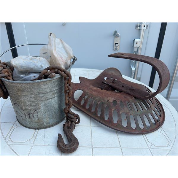 Tractor Seat, Metal Chain with Hook, and Pail of Hardware