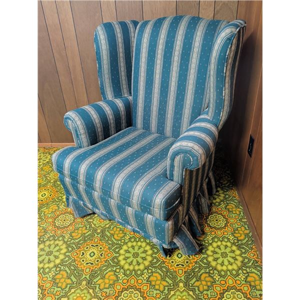 Upholstered Wingback Armchair with Striped Pattern