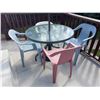 Image 3 : Patio Table With Glass Top, Four Plastic Chairs, and Green Umbrella