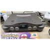 Image 2 : Nintendo 64 Console with 6 Controllers, Cables, and Pokémon Puzzle League Game