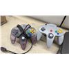 Image 6 : Nintendo 64 Console with 6 Controllers, Cables, and Pokémon Puzzle League Game