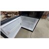 Image 6 : LG Black Bottom-Freezer Refrigerator with Interior Shelves, Crisper Drawers, and Door Bins
