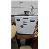 Image 1 : Compact Single-Door Mini Refrigerator with Freezer Compartment and Aftermarket Stickers