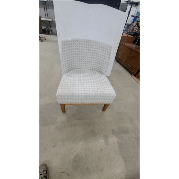 Upholstered Slipper Chair with Curved Back and Geometric Lattice Pattern on Wooden Legs