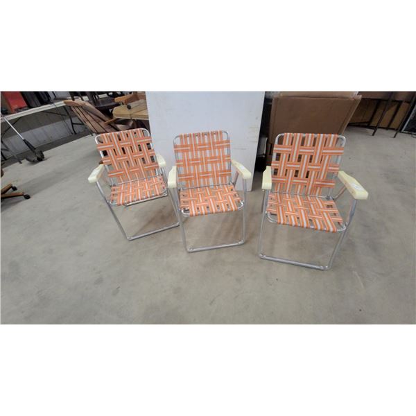 Set of Three Vintage Aluminum Folding Lawn Chairs with Orange and White Woven Webbing