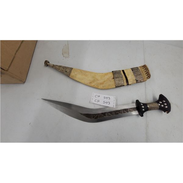 Traditional Nepalese Kukri with Etched Curved Blade, Studded Wood Handle, and Decorated Sheath 22"
