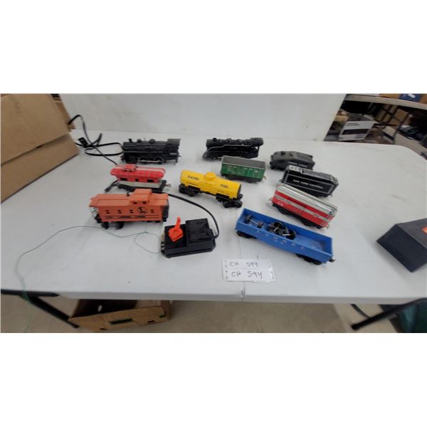 Lionel O Gauge Model Train Lot with 8704 Diesel Switcher, Steam Engine, Freight Cars and More One
