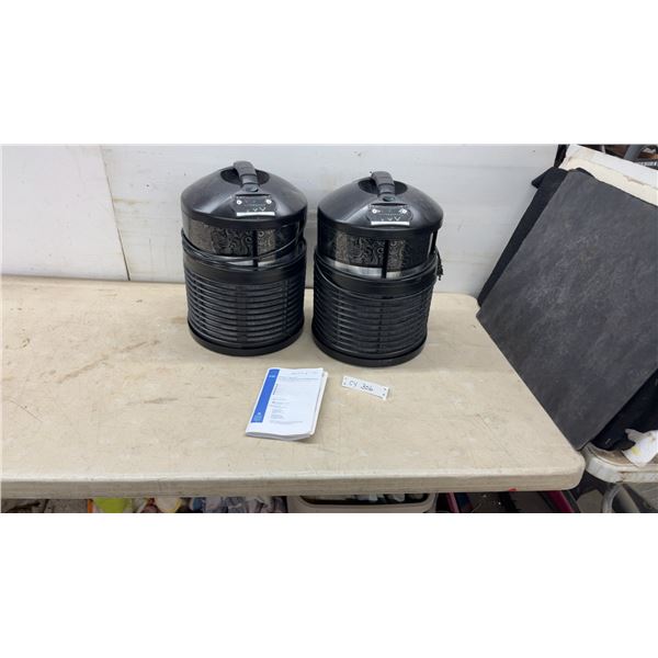 Pair of FilterQueen Defender Cylindrical Air Purifiers with Handles