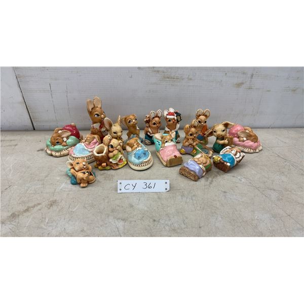 Collection of 17 Ceramic Bunny Figurines, Including Sleeping, Musical, & Dressed Bunnies