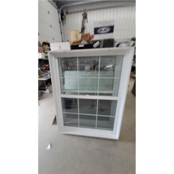 Merick White Vinyl Double-Hung Window with 6-over-6 Grille Pattern 46" x 60"