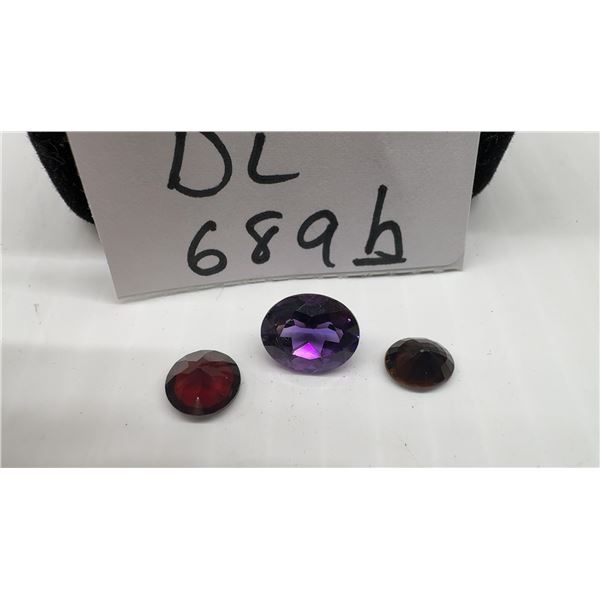 Three True Gemstones: 2.18ct VS Round Natural Medium Reddish Orange Garnet, 3.59 ct VS Oval