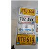 Image 2 : Collection of 17 Vintage and Modern License Plates: Manitoba, Alberta, and Puerto Rico