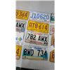 Image 3 : Collection of 17 Vintage and Modern License Plates: Manitoba, Alberta, and Puerto Rico