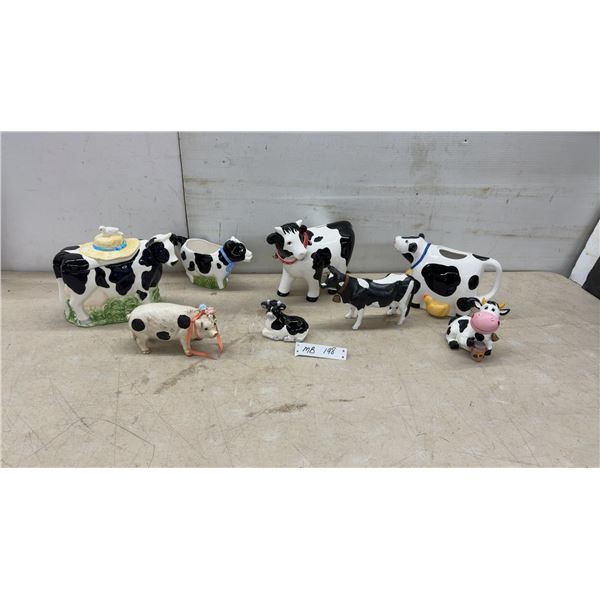 Collection of Ceramic Cow Figurines, Cookie Jar, Creamers, Pig Figurine and More