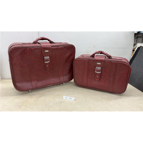 Two Streamline Red Leather-Style Suitcases