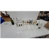 Image 1 : Vintage Glass Bottle Collection: Embossed Milk Bottles, Tanqueray, and 7Up