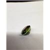 Image 14 : Three True Gemstones: 4.93 Carat Round Natural Green Tourmaline, 2.79 ct VVS Oval Matt Purple