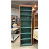 Image 1 : Tall Narrow Wooden Bookshelf with Carved Trim, Reddish-Brown Finish and Green Interior, with