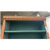 Image 4 : Tall Narrow Wooden Bookshelf with Carved Trim, Reddish-Brown Finish and Green Interior, with