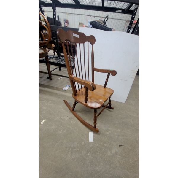 Traditional Wooden Spindle-Back Rocking Chair With Saddle Seat and Turned Legs