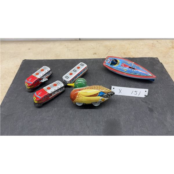 Vintage Schylling "Fireball" Boat, Wind-Up Duck, and 2 Tin Litho Train Cars