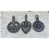 Image 4 : Assorted Cast Iron Trivets and Wall Hangings: "Bless This House" Plaque, Floral and Clown Tiles