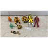 Image 1 : Assorted Action Figures and Robot Toys: Iron Man, Yellow Power Ranger, Bumblebee-Style Robot