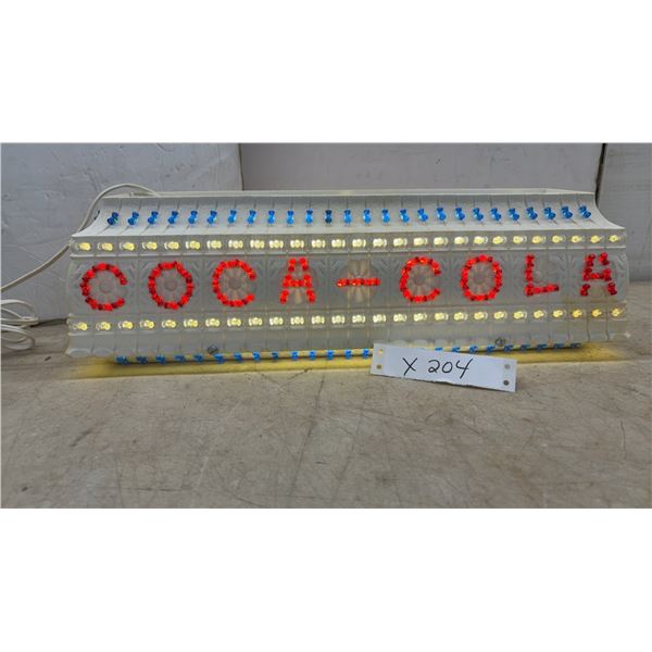 Vintage Coca-Cola Light-Up Sign with Red and Blue Plastic Pegs, and Power Cord, 6 × 18 d 6”