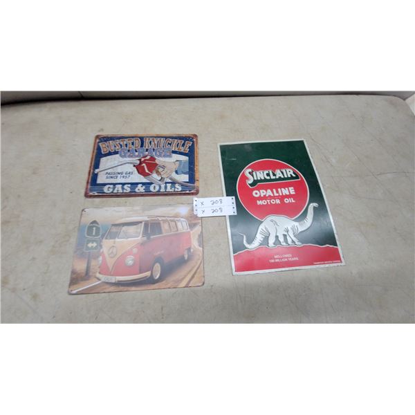 Three Tin Signs: Volkswagen Bus, Busted Knuckle Garage, and Sinclair Opaline