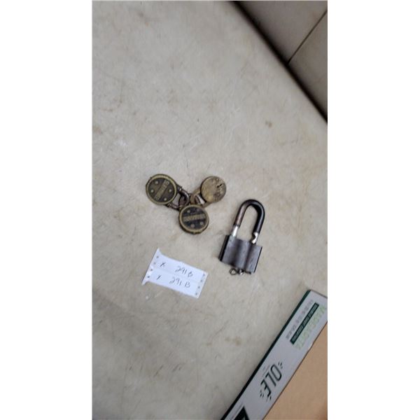 Three Vintage Slaymaker Brass Disc Padlocks and Additional Steel Shackle Padlock