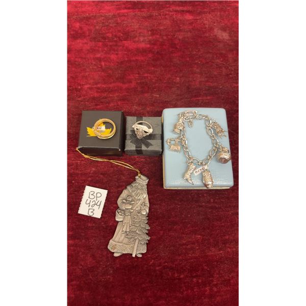 Avon Jewelry Lot: 2 Rings, 1 Charm Bracelet, and Tree Ornament