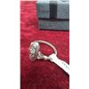 Image 9 : Avon Jewelry Lot: 2 Rings, 1 Charm Bracelet, and Tree Ornament