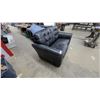 Image 2 : Black Leather-Style 2-Cushion Couch