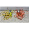 Image 1 : Two Work Lights: Yellow and Orange, Each with Bulb, Metal Cage, and Extension Cord