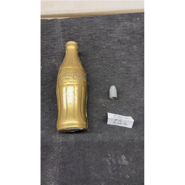 Coca-Cola Brass Bottle and Lead Bullet