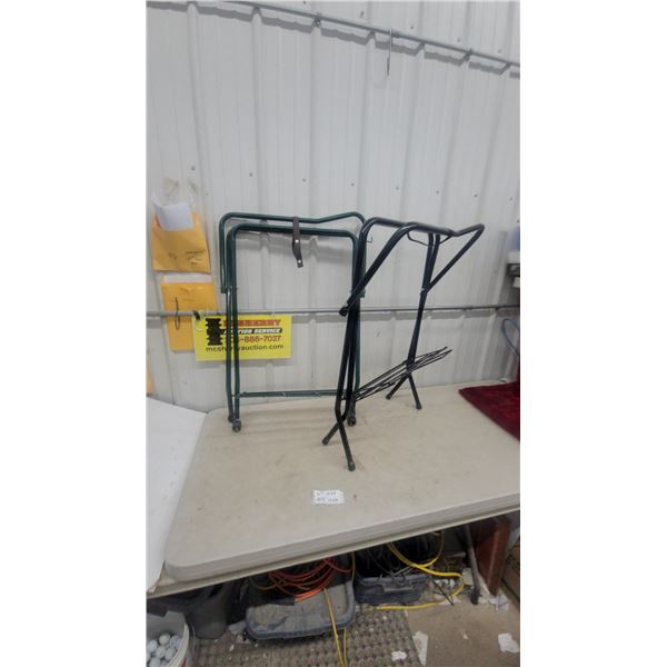 Two Portable Folding Saddle Stands, Green with Wheels and Leather Strap, and Black