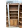 Image 4 : Three Wood Bookcases, One with Two-Door Cabinet and Blue Snowflake Knobs 25 × 10 × 68