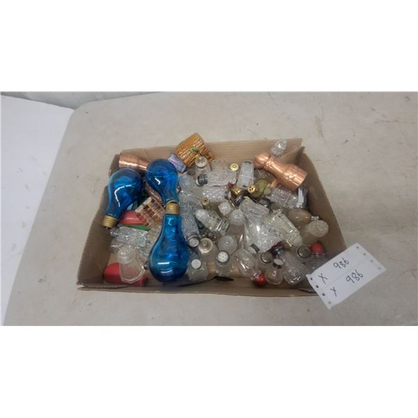 Assortment of Glass Salt and Pepper Shakers and Blue Decorative Light Bulbs
