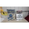 Image 1 : Monroe Super Struts, Cartridges “Sold Here,” and “Ride Safe” Advertising Signs