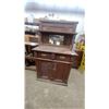 Image 1 : Antique Victorian Wooden Sideboard Buffet with Mirrored Hutch, Two Drawers, and Two Cabinet Doors