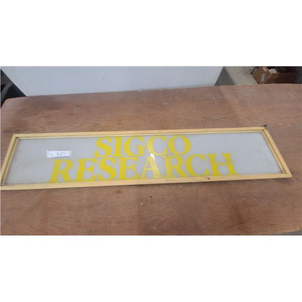 Vintage Sigco Research Framed Glass Advertising Sign, Yellow Lettering on White 10” × 48”