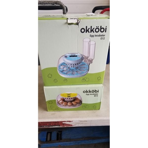 2 NEW OKKOBI EGG INCUBATORS. MODELS M12 AND E12