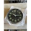 Image 3 : 3 NEW 12 INCH WALL CLOCKS. TWO ARE BLACK WITH A CHROME FINISH. ONE IS BLACK WITH A WHITE FINISH