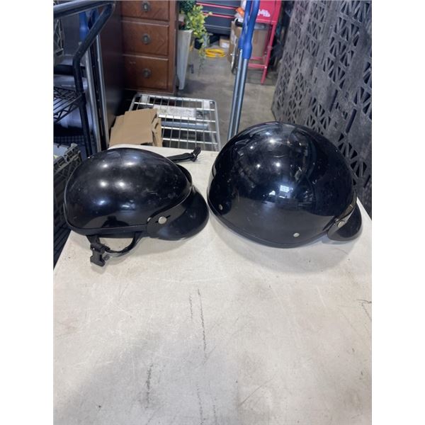 2 MOTORCYCLE HELMETS. ONE IS MADE BY DOT