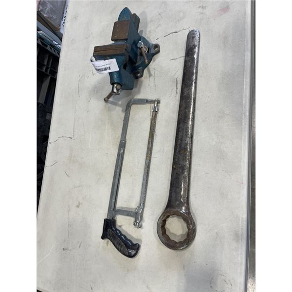 3 INCH BENCH VISE AND LARGE WRENCH, MADE IN USA AND SAW