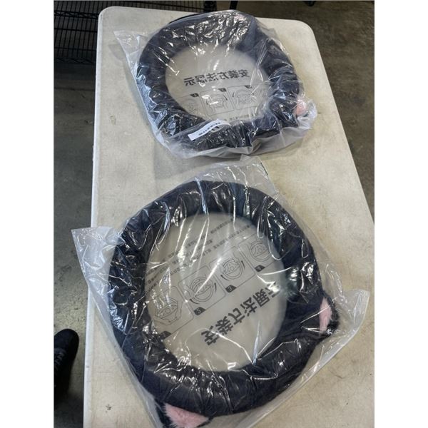 2 NEW STEERING WHEEL COVERS