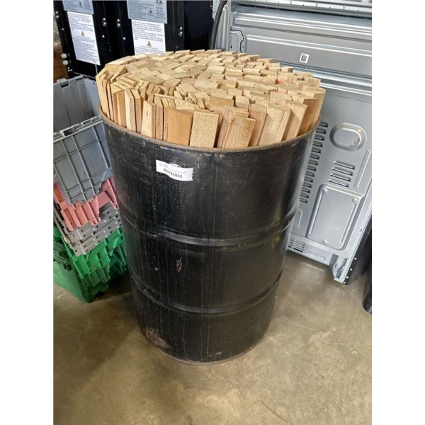 METAL BARRELL FULL OF HEMLOCK WOOD PIECES, 1" X 2" X 37" AND 1/4" X 2" X 37"