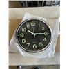 Image 3 : 3 NEW 12 INCH WALL CLOCKS. TWO ARE BLACK WITH A CHROME FINISH. ONE IS BLACK WITH A WHITE FINISH