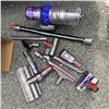 Image 1 : DYSON V15 TOTAL CLEAN CORDLESS STICK VACUUM WITH CHARGER AND ACCESSORIES WORKING